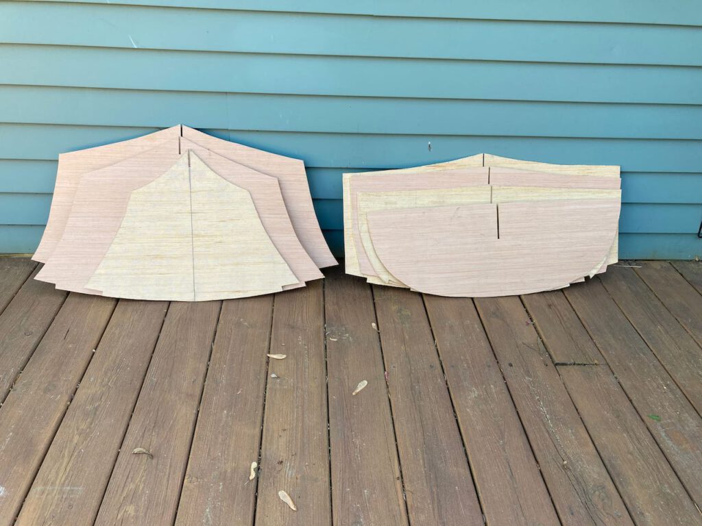 A set of plywood cutouts will become bulkheads.